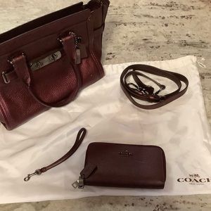Beautiful plum metallic Coach